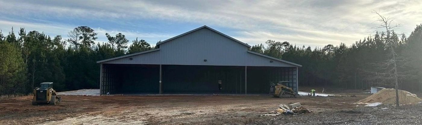 Pole Barn fabricated wing additions along with roller doors — photo 2