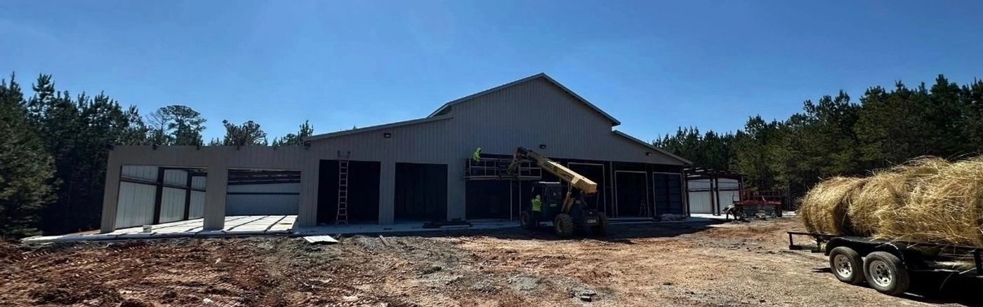 Pole Barn fabricated wing additions along with roller doors — photo 3