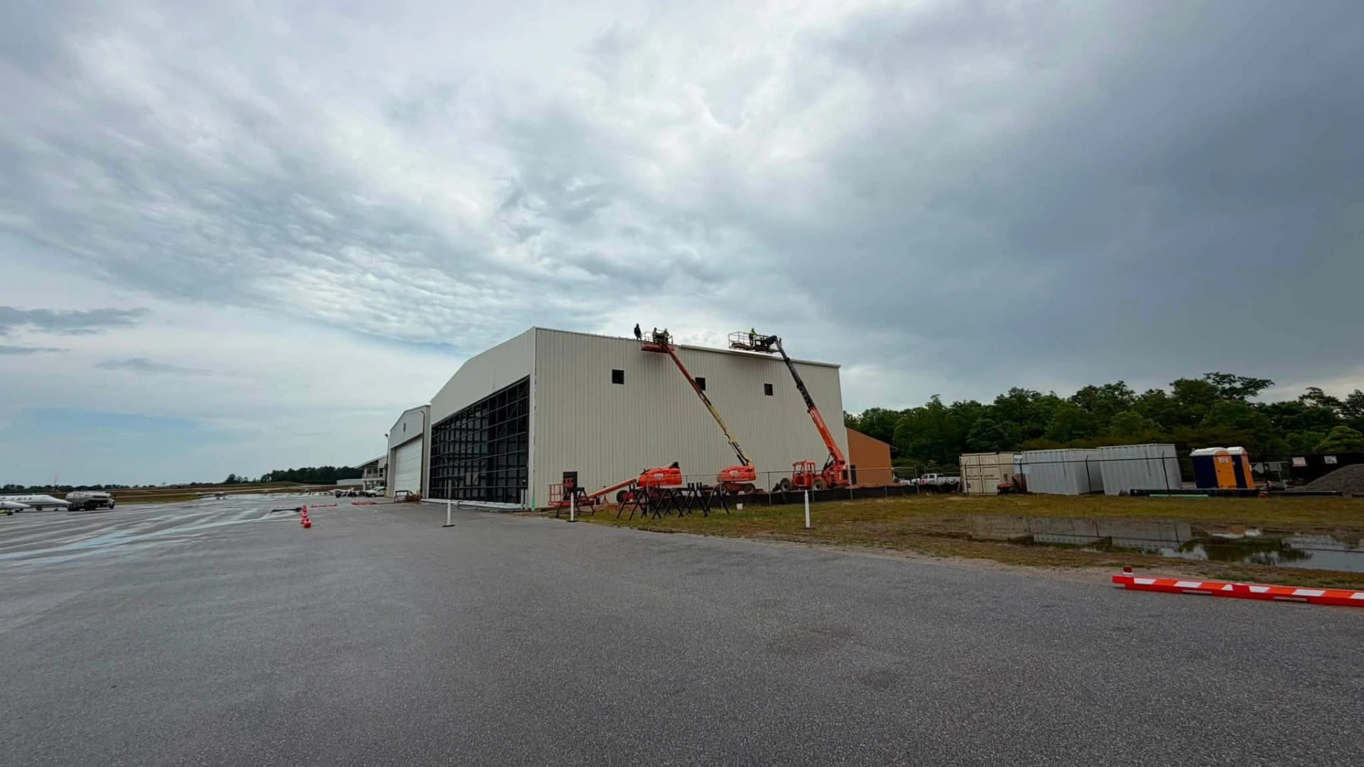 Crews finishing trim on the Auburn FBO hangar