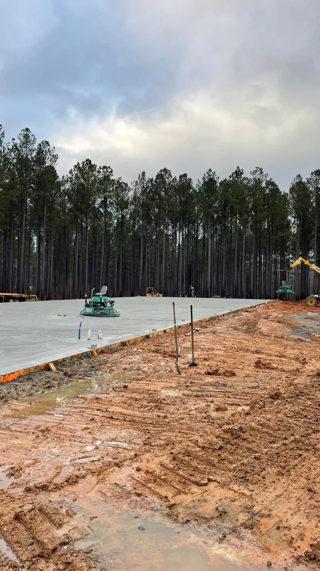Power troweling the horse barn slab