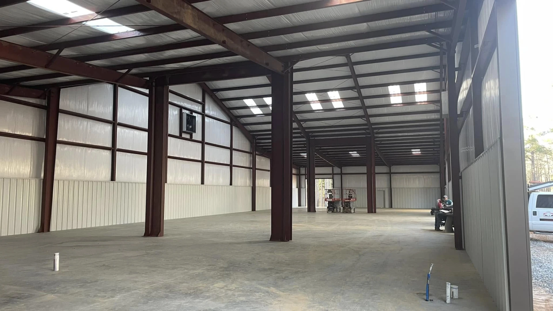 Interior of the horse barn with insulated walls and finished concrete floor